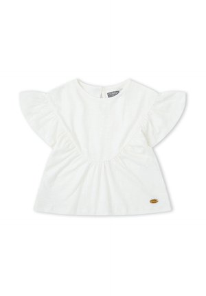 Blusa para bebé blanca con mangas cortas con volantes, cuello redondo, detalle fruncido en la parte delantera y una pequeña etiqueta marrón de la marca cerca del dobladillo.