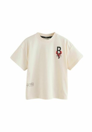 Cream cotton t-shirt with short sleeves, featuring a red lobster graphic and black "B" logo on the chest, and text at the bottom left.