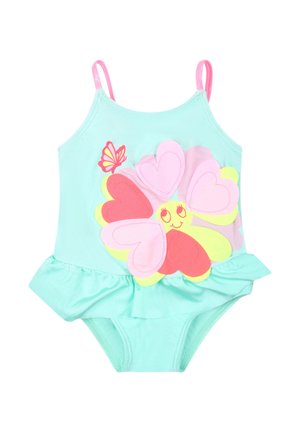 Un maillot de bain vert menthe avec des bretelles spaghetti, présentant un grand motif de fleur en rose, rouge et jaune avec un accent de papillon et un ourlet à volants.
