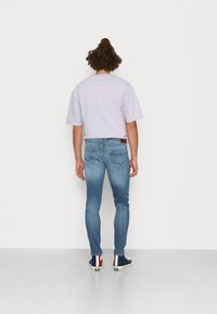 Pepe Jeans FINSBURY - Calças de ganga de corte skinny - denim