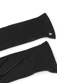 Black leather gloves with a long cuff, featuring a smooth texture, detailed stitching, and a small metallic accent on the wrist.