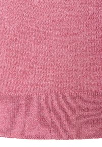 Gestrickter Pullover in sanftem Pink mit strukturierter Oberfläche. Besitzt einen gerippten Saum für zusätzlichen Detailreichtum und Struktur. Glattes, kuscheliges Material.