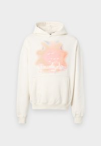 Cremfarbener Hoodie mit einer Fronttasche, der ein pastellfarbenes Grafikdesign von Sonne und Vögeln zeigt. Weicher Stoff, lockere Passform, gerippte Bündchen und Saum.