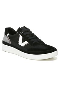 Black and gray sneaker featuring suede and canvas material, white accents, round toe, thick white sole, and lace-up closure.