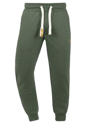 Pantaloni sportivi verdi realizzati in cotone misto. Caratterizzati da un elastico in vita con lacci bianchi e polsini a coste. Dettaglio logo discreto.