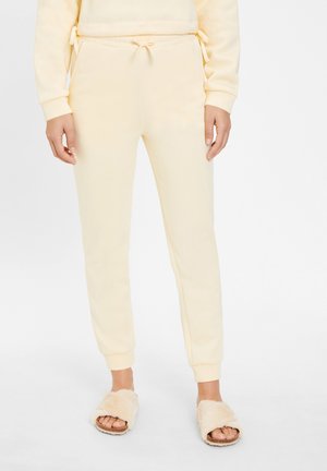Tracksuit bottoms - pastellgelb