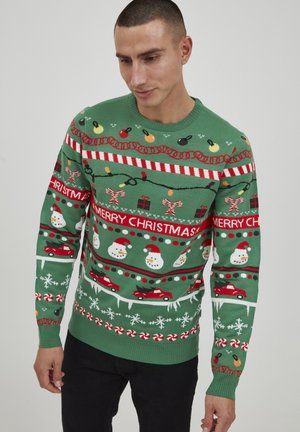 Roheline kudumine jõulusweater, millel on lumeinimesed, autod, kommipulgad ja pidulikud mustrid. Ümar kaelus, pikad varrukad ja soonikkoes mansetid.