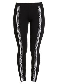 Leggings neri Adidas con strisce laterali bianche che presentano un motivo ripetuto del logo Adidas e del trifoglio, vestibilità attillata e vita alta.