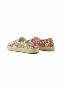 Floral-patterned espadrilles with a natural jute sole, featuring vibrant colors on a canvas upper and elastic side panels for easy wear.