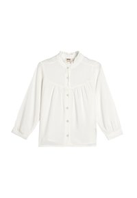 Camisa blanca de botones con un alto cuello con volantes, mangas largas con puños elásticos, y un panel frontal fruncido. Textura de tela suave.