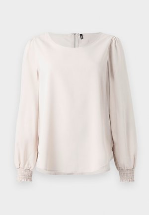 Hellrosa Bluse mit langen Ärmeln, rundem Ausschnitt, gerafften Manschetten und einem Reißverschluss auf der Rückseite. Aus weichem, glattem Stoff gefertigt.