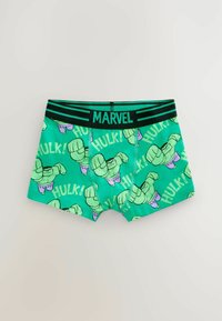 Green boxer shorts featuring Hulk illustrations and the text "HULK!" on a playful background. Black elastic waistband with "MARVEL" label.