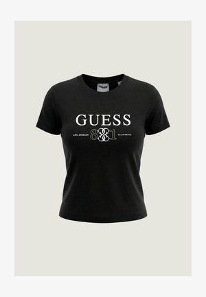 Czarny krótki T-shirt z krótkim rękawem, z napisem "GUESS 1981 LOS ANGELES CALIFORNIA" w białym kolorze na przodzie.
