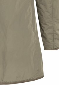 Lightweight, olive green jacket with a smooth texture, water-resistant material, and subtle stitching details along the seams and hem.