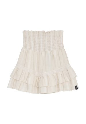 Falda mini sin tirantes en color crema con diseño de volantes en capas. Presenta rayas texturizadas y un borde de encaje en el dobladillo.