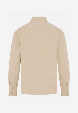 Beige Langarmhemd mit geknöpften Manschetten und klassischem Kragen, von hinten auf weißem Hintergrund gezeigt.