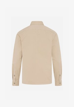 Beige Langarmhemd mit geknöpften Manschetten und klassischem Kragen, von hinten auf weißem Hintergrund gezeigt.