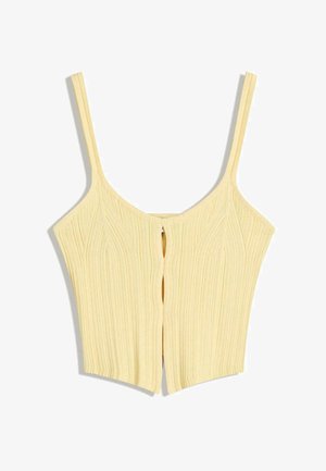 Keltainen ribbikuvioinen lyhyt toppi ohuilla hälytyksillä, jossa on eteen tuleva vetoketjukiinnitys ja teksturoidut kuviot istuvassa designissa.