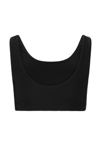 Mustapohja urheilbra tapahtuu sileästä, joustavasta kankaasta. Siinä on leveät hihnat ja pyöreä kaula-aukko, jotka tarjoavat saumatonta, minimalistista muotoilua.