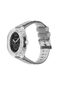 Montre transparente avec un cadran noir, fonctionnalités de chronographe et un bracelet en silicone transparent. Lunette hexagonale et accents en métal pour la durabilité.