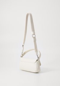 Tommy Jeans EVERYWHERE FLAP  - Handbag - beige