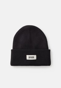Must haaratud beanie, mis on valmistatud soonikust kangast. Omab volditud äärt, millel on valge silt, millel on brändi nimi "DRYKORN."