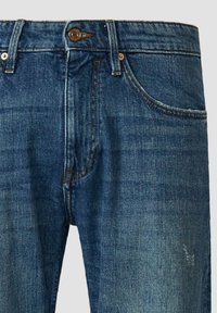 Dunkelblaue Jeans aus Denim mit klassischem Schnitt, versehen mit vorderen Taschen, einem Knopfverschluss und dezenten Ausbleichungen entlang der Oberschenkel.