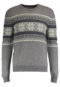 Pull gris en tricot présentant un motif flocon de neige et géométrique en blanc et bleu marine, avec des poignets et un ourlet côtelés. Design classique à col rond.