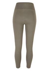 Olijfgroene leggings met een gladde textuur, hoge taille en aansluitende pasvorm, zonder zichtbare patronen of hardwaredetails.