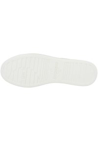 White rubber shoe sole with a textured surface, horizontal and vertical grooves, and embossed branding details for traction.