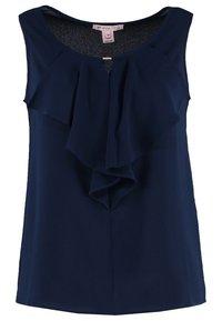 Námořnická modrá bezramínková halenka s volány v přední části, kulatým výstřihem a hladkým, lehkým materiálem. Disponuje jemným leskem a čistým siluetou.
