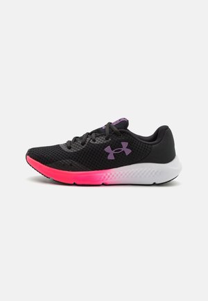 Black athletic shoes with mesh upper, purple accents, and a gradient pink to white sole. Features round laces and a logo on the side.