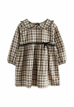 Abito a scacchi in beige e nero, con colletto rotondo e arricciato, maniche lunghe, vita impero e dettagli in nastro nero.