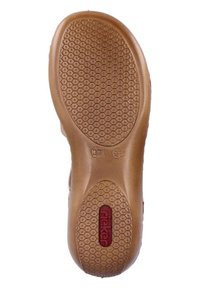 Semelle de chaussure en caoutchouc marron avec un motif hexagonal, comportant un logo rouge et un indicateur de taille "37" embossé sur le côté.