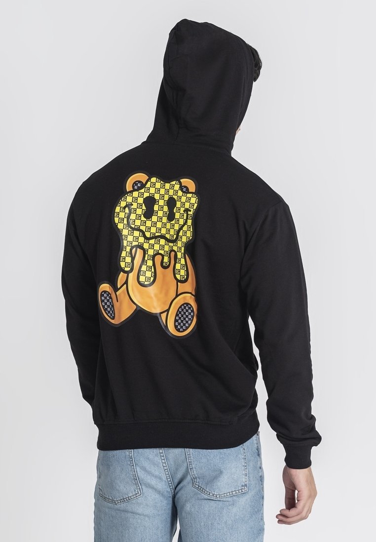 Felpa nera con cappuccio caratterizzata da una grande grafica di un orso colorato sul retro con un motivo a scacchi. Vestibilità regolare, tessuto morbido, tasca a marsupio.