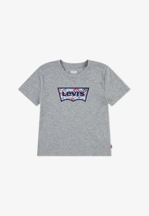 Pelēka kokvilnas T-kreklu ar īsām piedurknēm. Priekšpusē ir krāsains Levi's logotipa grafika sarkanā, zilā un baltā krāsā. Klasisks apaļš kakla dizains.