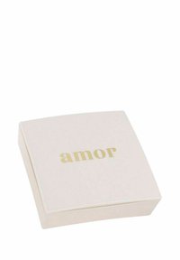 Scatola quadrata, di un tenue rosa pallido, con una superficie liscia e lettering dorato "amor" sulla parte superiore. Design semplice e moderno con angoli arrotondati.