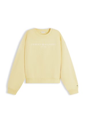 Ανοιχτό κίτρινο φούτερ Tommy Hilfiger με λευκό λεκτικό λογότυπο και μικρό έμβλημα σημαίας στη μανσέτα του αριστερού μανικιού, στρογγυλή λαιμόκοψη και ριμπ τελειώματα.