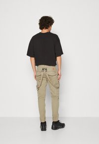 Alpha Industries UTILITY  - Cargobukse - vintage sand