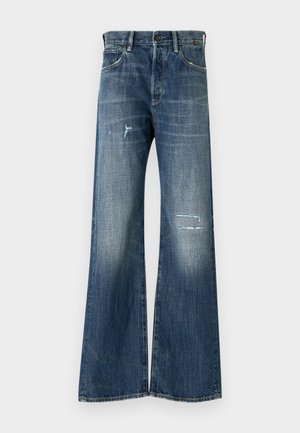 Vide benbukser i mørkeblå denim med et slidt design, som inkluderer frynsetapper og diskret falmning. Klassisk fem-lomme stil.