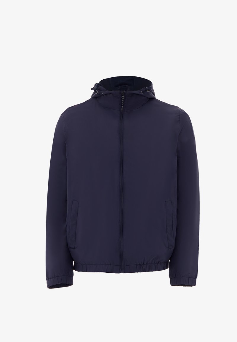 Tamsiai mėlyna lengva striukė su užtrauktuku priekyje, gobtuvu, elastinėmis rankogaliais ir šoninėmis kišenėmis. Lygus audinys su šiek tiek blizgiu paviršiumi.