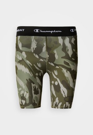 Pantaloni scurți de compresie cu imprimeu camuflaj în tonuri de verde. Realizați dintr-un material elastic, cu o talie neagră cu logo, având modele contrastante mai deschise.