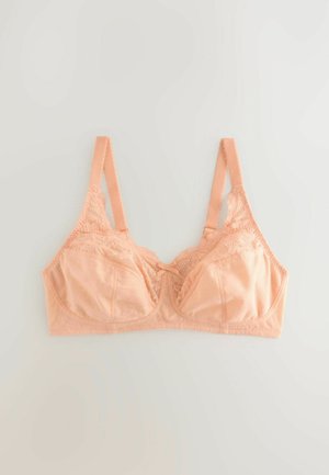 Perzikkleurige bralette met kant, zachte stof, onderbedekking, verstelbare banden en een delicate strikdetail aan de voorkant.