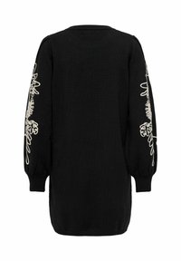 Zwarte gebreide trui met lange mouwen, voorzien van een uitgebreide witte bloemenborduursel op de mouwen. Rechte zoom en geribbelde manchetten.