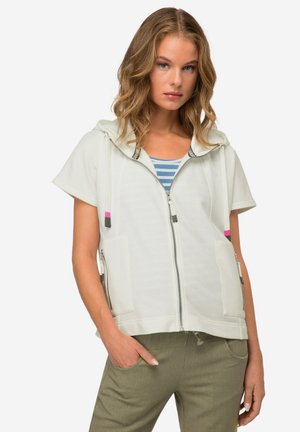 Kurze weiße Zip-Hoodie mit kurzen Ärmeln, Vordertaschen und Kordelzügen. Mit pinken und grauen Hardware-Akzenten.