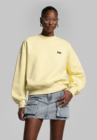 WRSTBHVR PAULA - Felpa - wax yellow