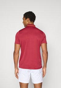 Fila CORVIN - Polo shirt - tibetan red