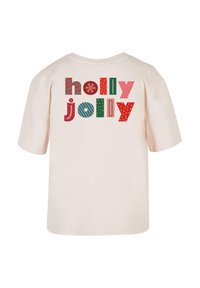 Heled pink puuvillane T-särk, millel on erinevates värvides ja mustrites, sealhulgas triibud ja täpid, tekst "holly jolly". Lühikesed varrukad.