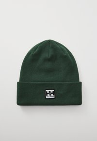 Dark green knit beanie with folded cuff featuring a black and white Helly Hansen logo patch centered on the cuff.