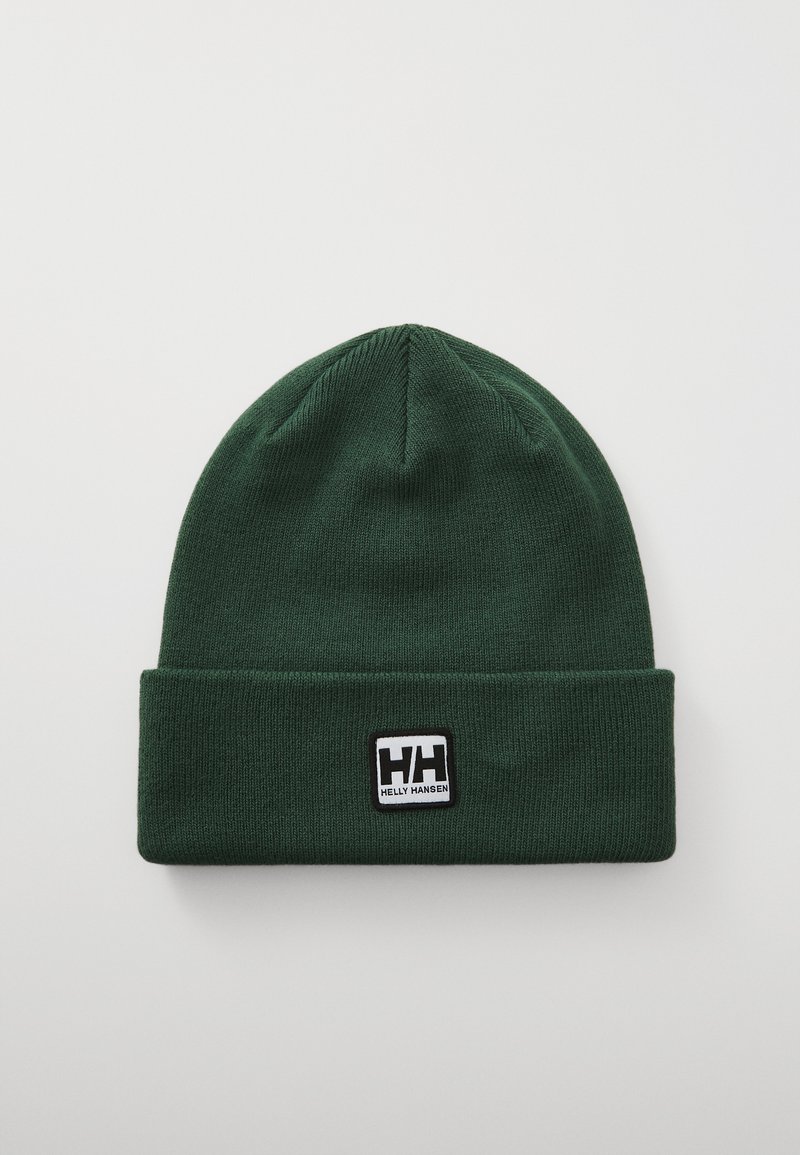 Dark green knit beanie with folded cuff featuring a black and white Helly Hansen logo patch centered on the cuff.